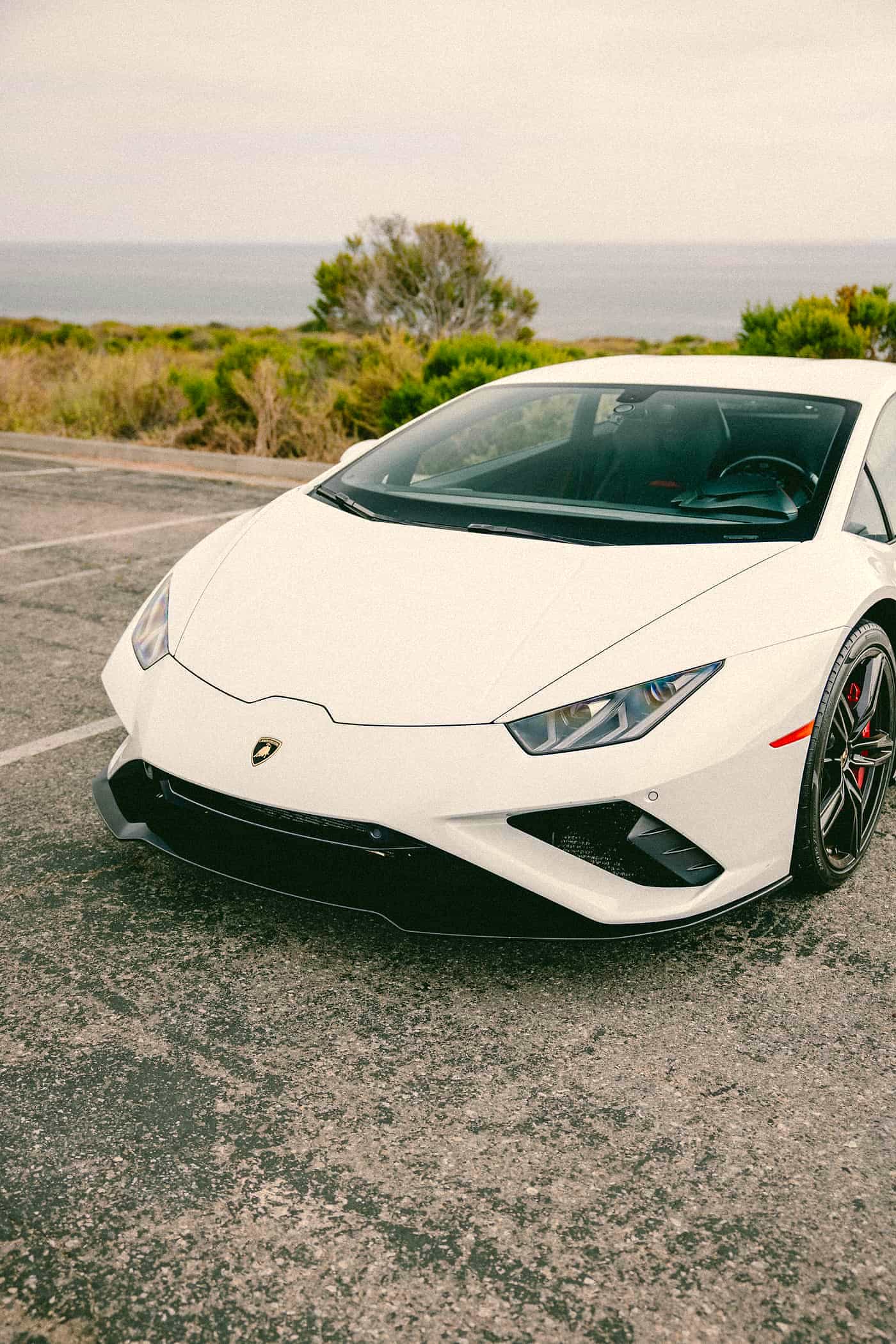 White Lamborghini Huracán front three-quarter