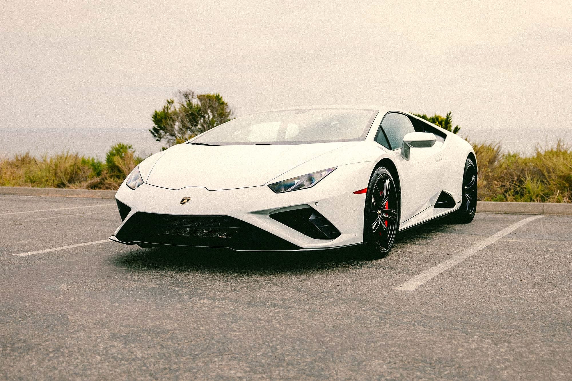 White Lamborghini Huracán staged in bright Orange County daylight